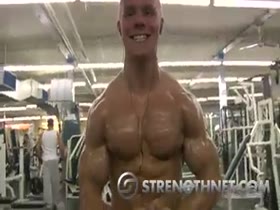 Young Eric Barrenger flexing