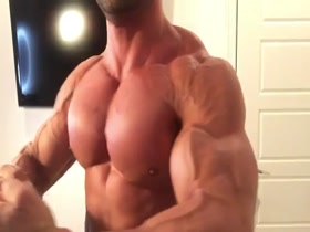 Flexing his twin Pec Mountains